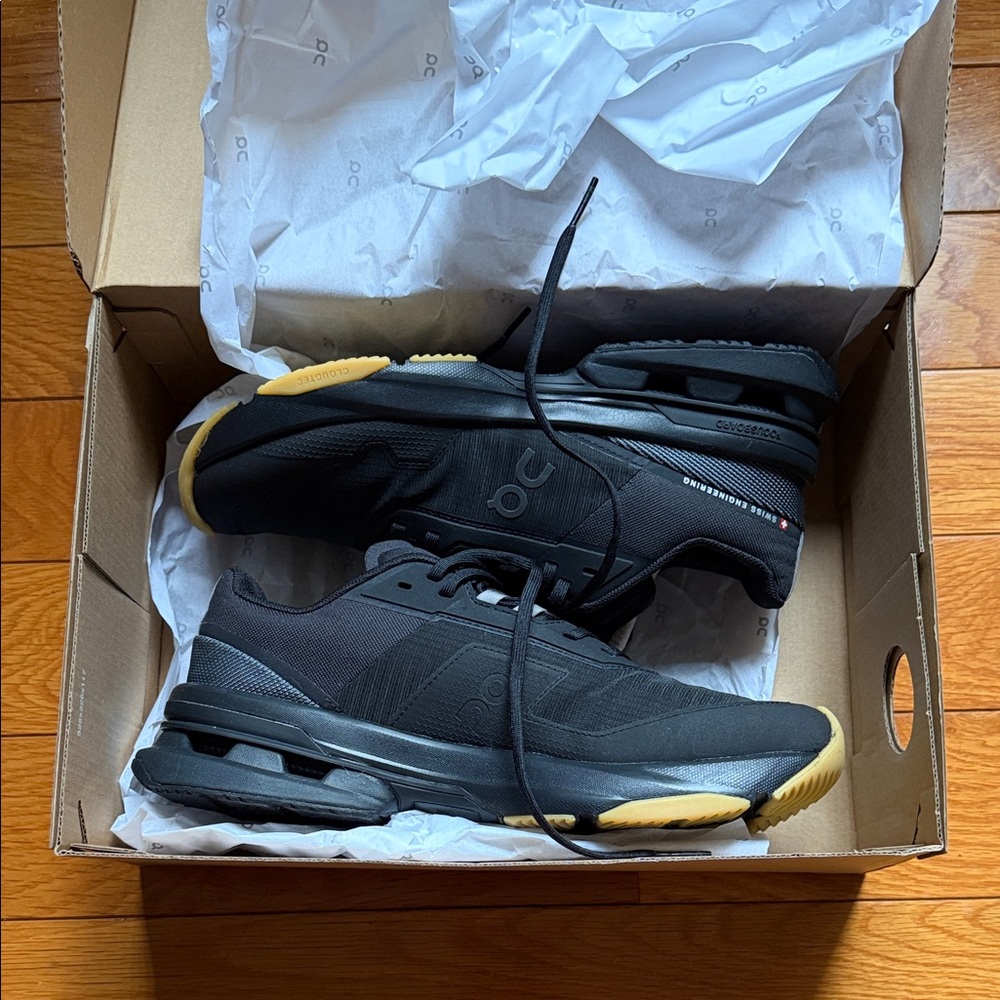 On Running Black and Gold Women's Sneakers